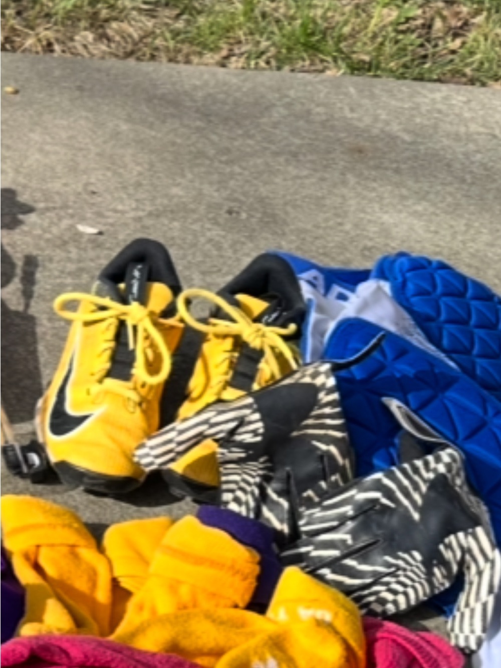 Nike Kids Yellow Black Athletic Cleats, padded shorts and shirt, socks, jerseys